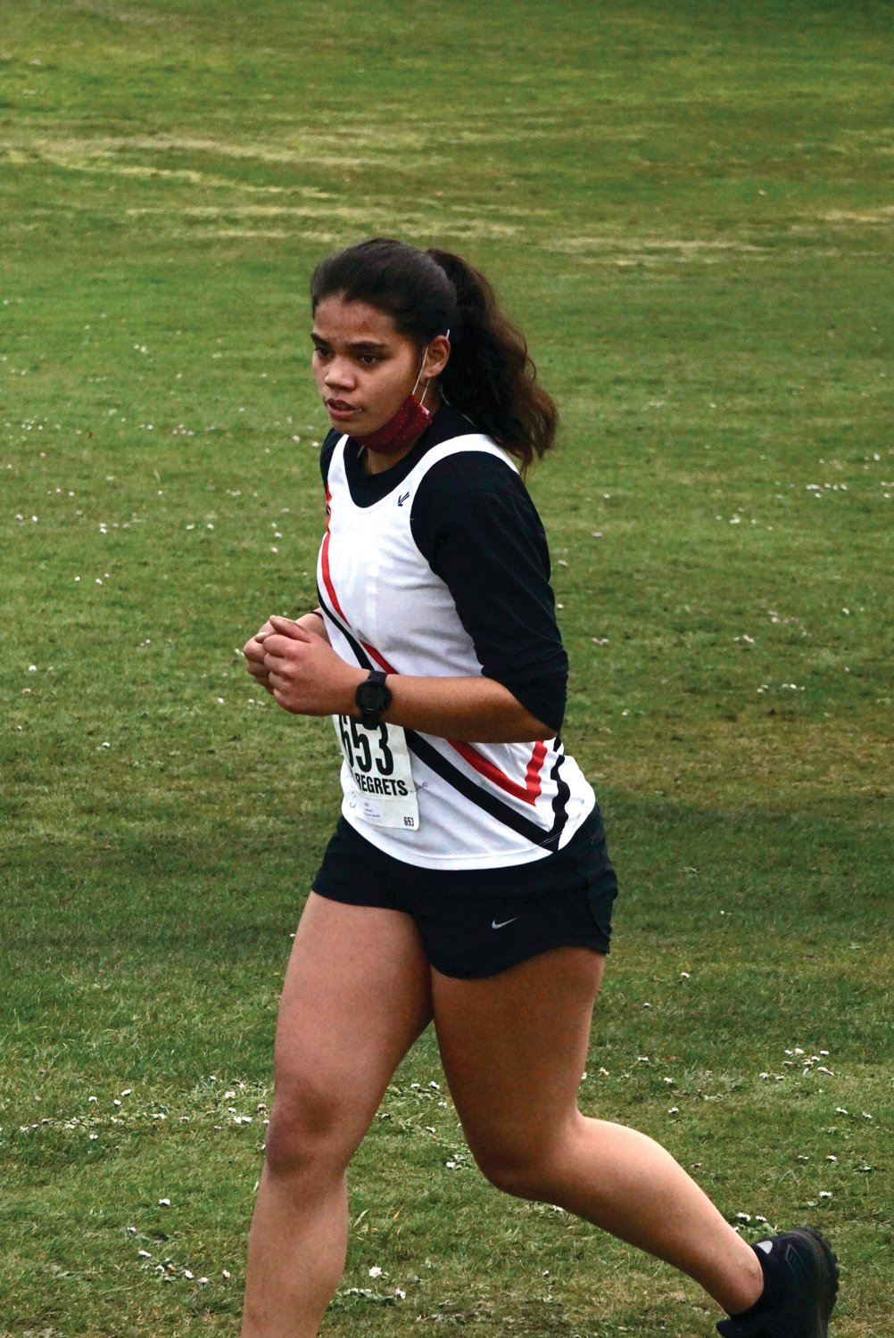 Freshman Aliyah Yearian keeps the pace as she runs for the East Jefferson cross country team at the Port Townsend Golf Course.